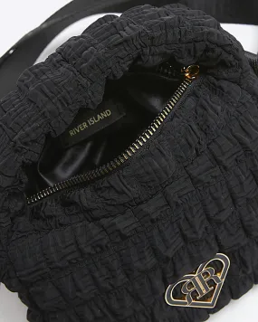 Girls black textured quilted cross body bag